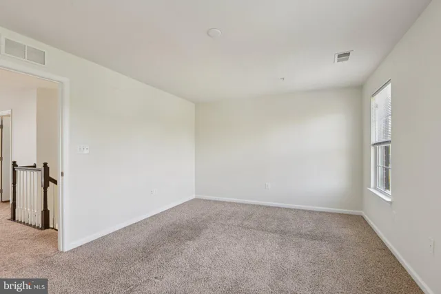 a bathroom with a tub and a shower