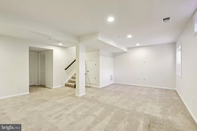 an empty room with a natural light