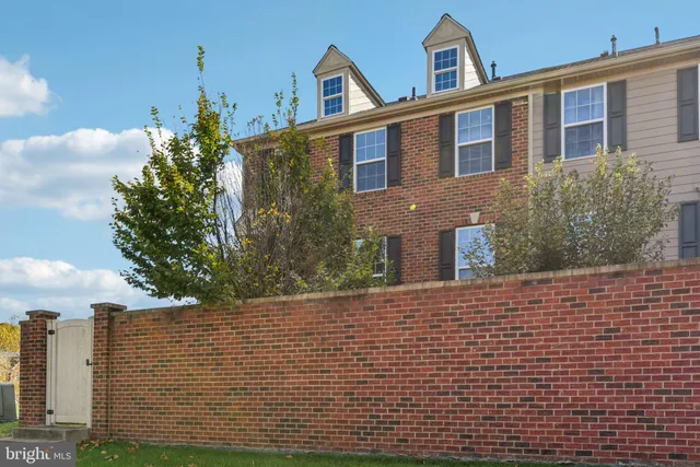a view of a building with a road