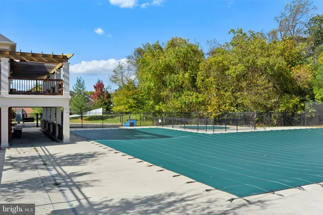 a view of a park with swings and slides