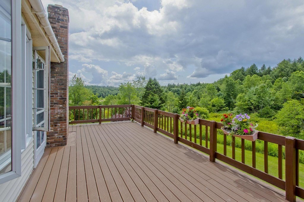 229 Number 9 Road Heath, MA 01367 - Photo 3 of 38 a view of balcony with deck and wooden floor