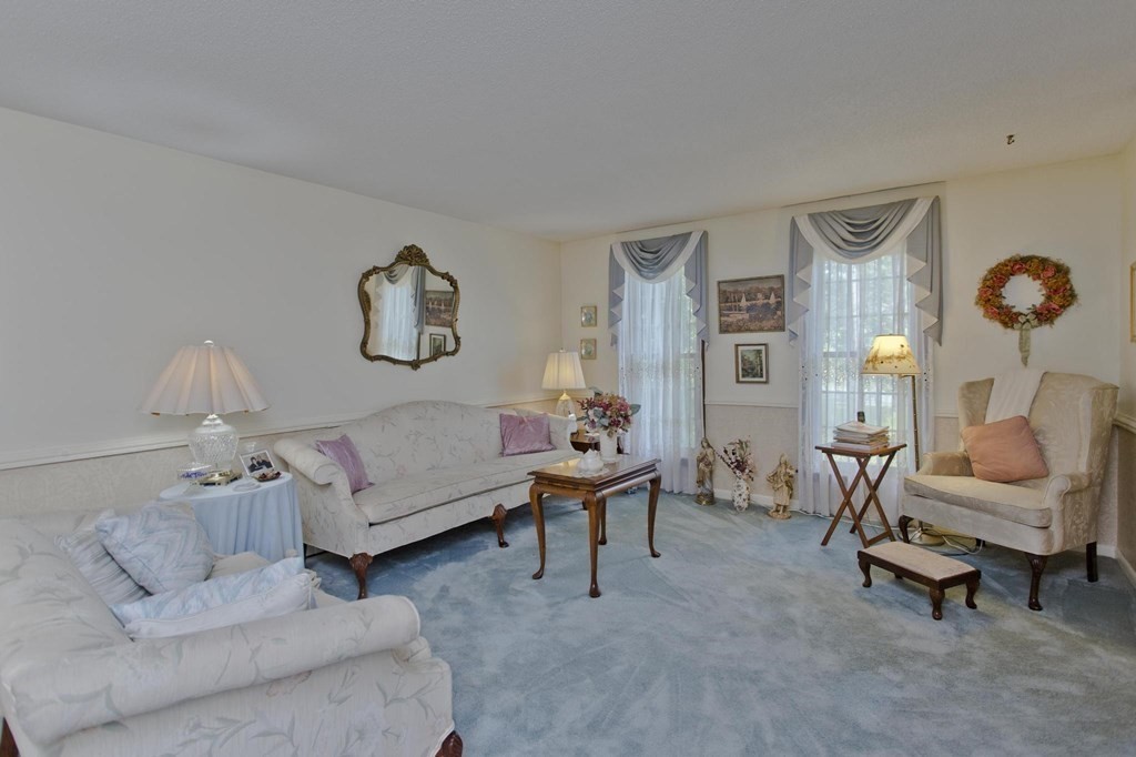 229 Number 9 Road Heath, MA 01367 - Photo 8 of 38 a living room with furniture and a window
