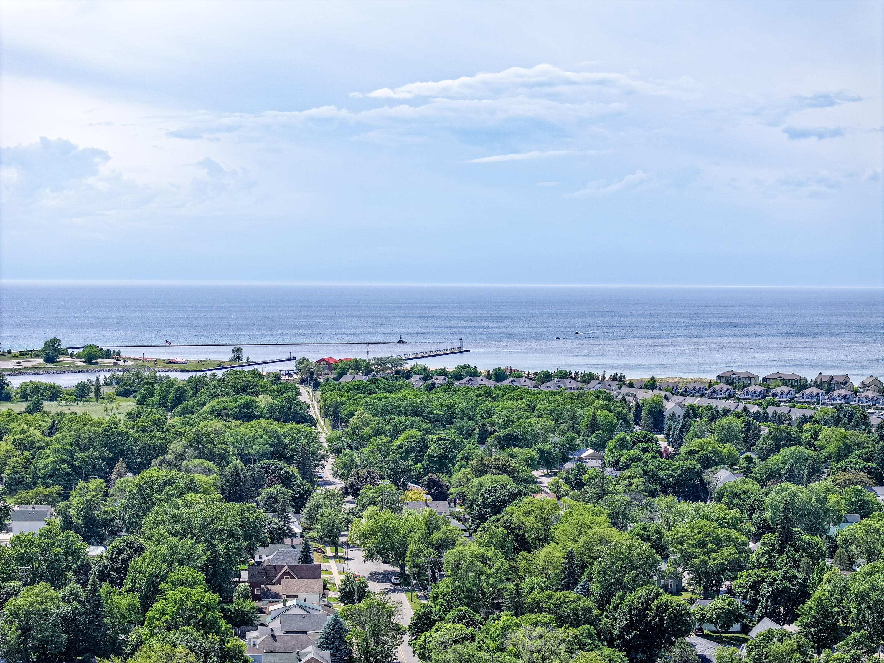 80 Washington Street, Unit 7 Manistee, MI 49660 - Photo 14 of 15 DJI_20260617040545_0216_D (1)
