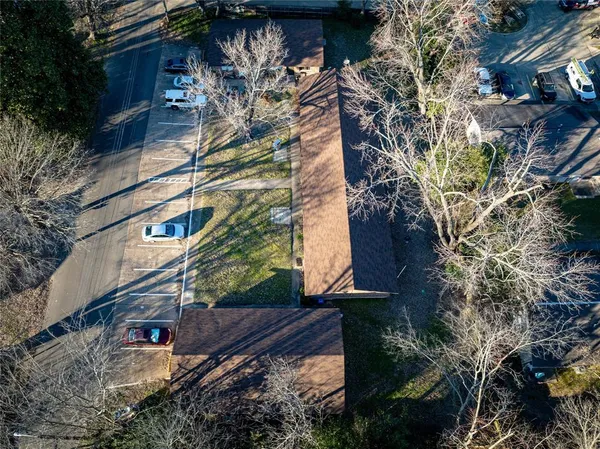a top view of a house with a yard