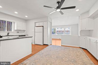 2712 Mower Street Philadelphia, PA 19152 - Photo 11 of 27 a kitchen with stainless steel appliances granite countertop a refrigerator and a sink
