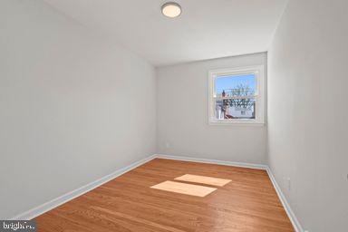 2712 Mower Street Philadelphia, PA 19152 - Photo 14 of 27 a view of a room with wooden floor and white walls