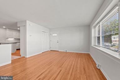 2712 Mower Street Philadelphia, PA 19152 - Photo 27 of 27 a view of empty room with wooden floor and fan