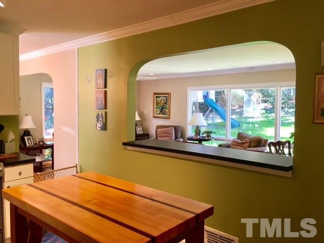 719 Beaver Dam Road Raleigh, NC 27607 - Photo 10 of 13 a view of a room with gym equipment