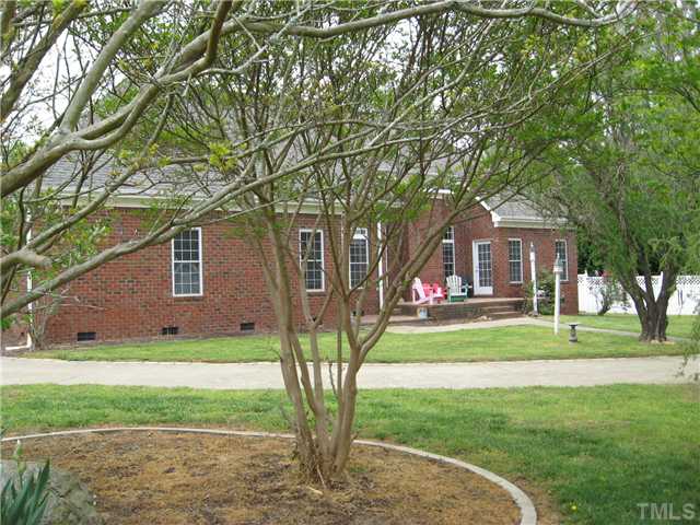 1001 Fieldgrass Place Raleigh, NC 27603 - Photo 15 of 20 REAR VIEW, RAISED PATIO WITH A LOWER LEVEL PATIO