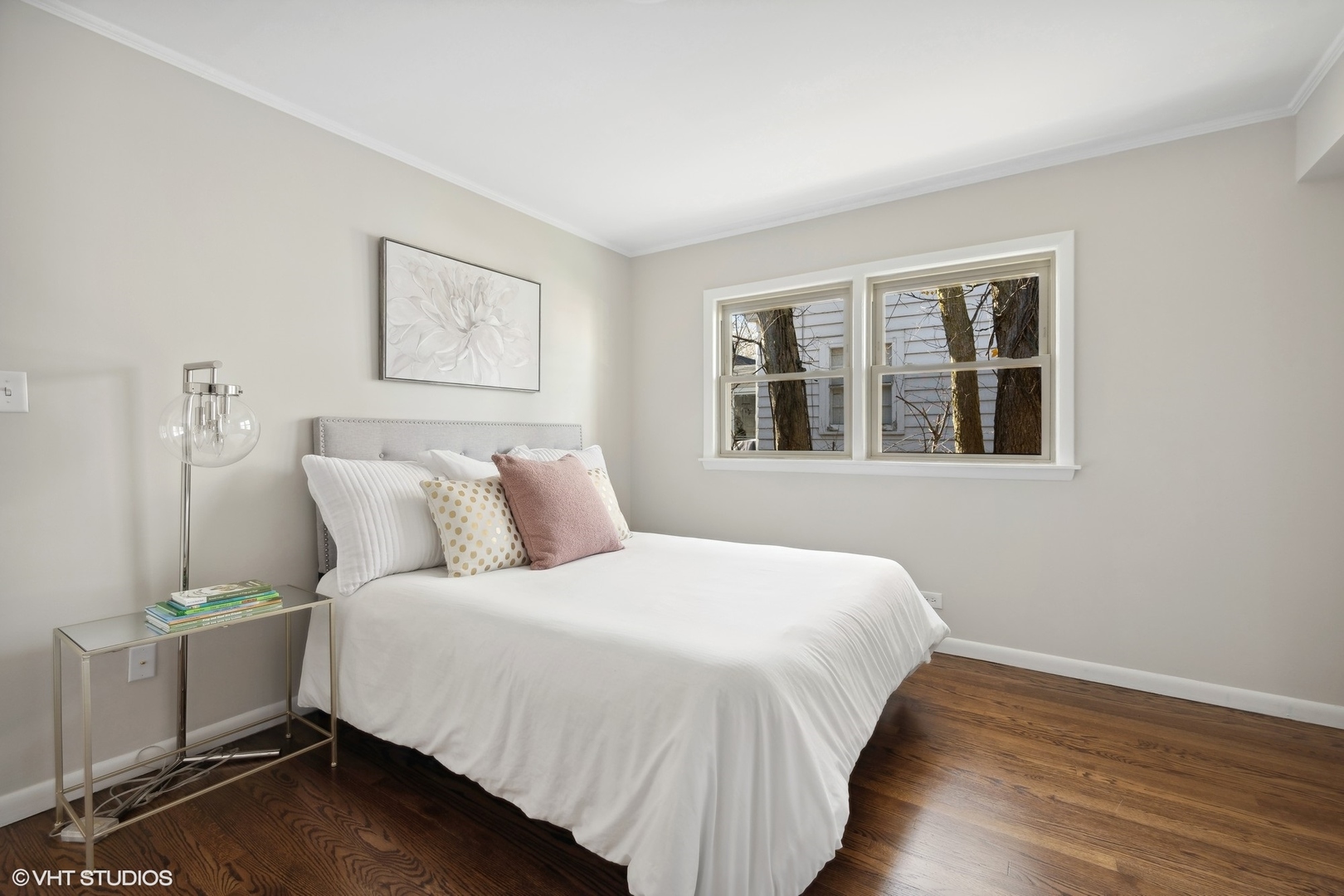 2237 Dewes Street Glenview, IL 60025 - Photo 11 of 20 a bedroom with a bed and wooden floor