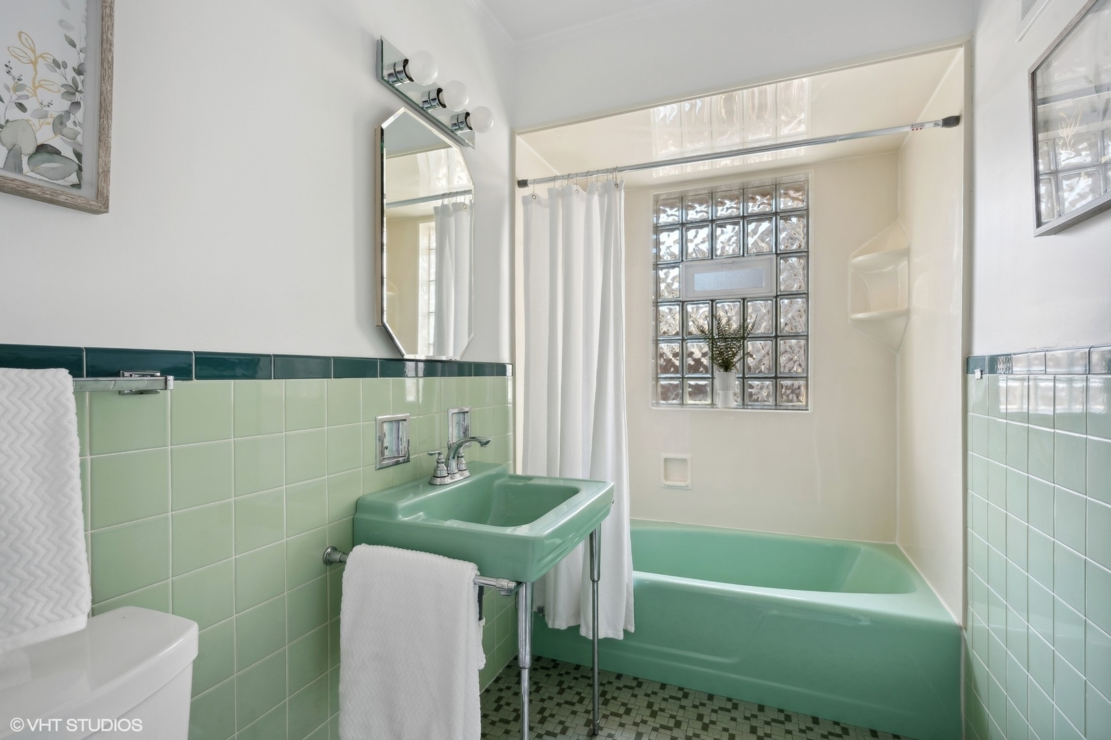 2237 Dewes Street Glenview, IL 60025 - Photo 13 of 20 a bathroom with a sink a toilet and shower