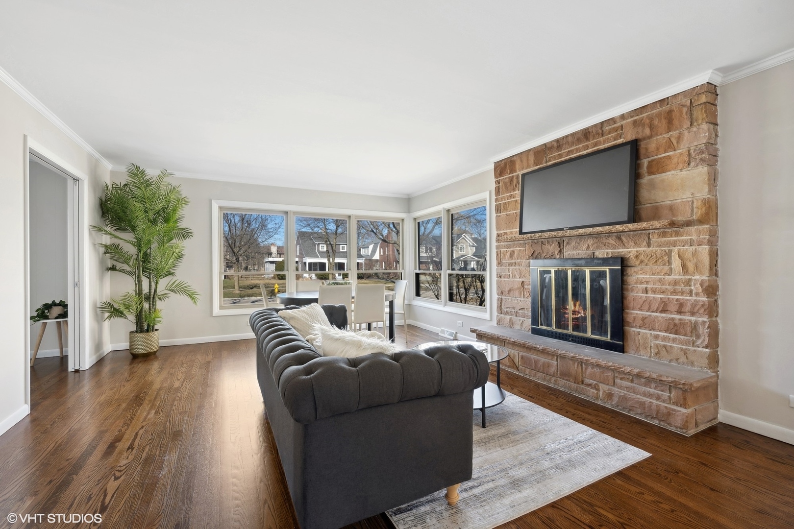 2237 Dewes Street Glenview, IL 60025 - Photo 4 of 20 a living room with furniture and a flat screen tv