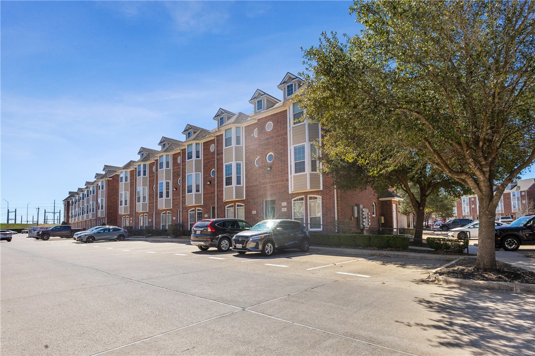 1198 Jones-Butler Road, Unit 606 College Station, TX 77840 - Photo 1 of 32 a view of a street with a building in the background