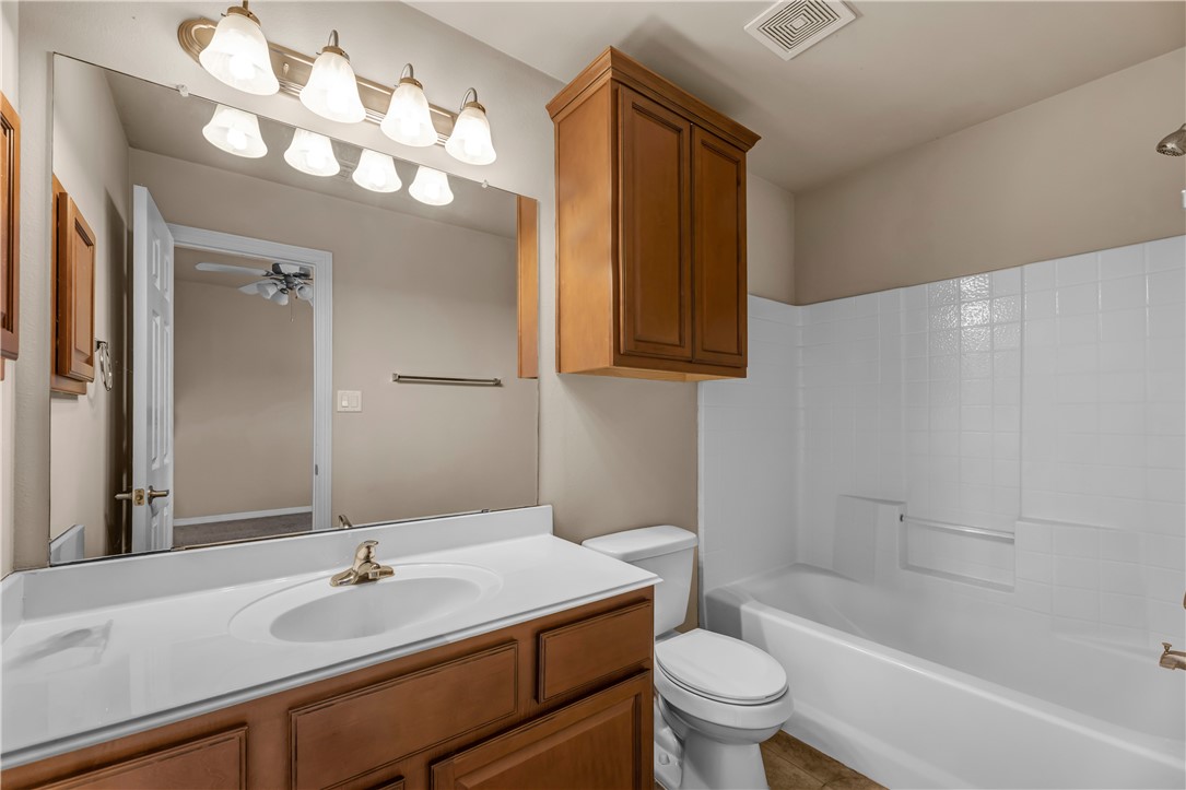 1198 Jones-Butler Road, Unit 606 College Station, TX 77840 - Photo 17 of 32 a bathroom with a sink a toilet and shower
