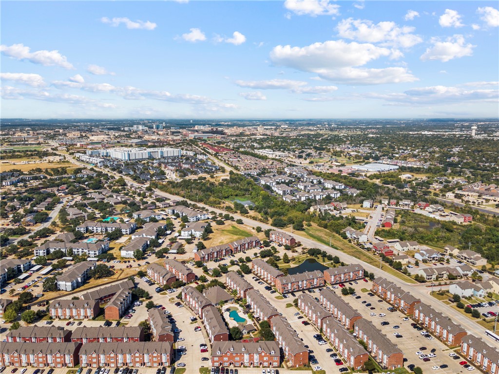 1198 Jones-Butler Road, Unit 606 College Station, TX 77840 - Photo 28 of 32 an aerial view of residential building with yard