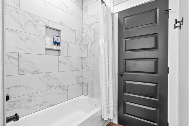 a bathroom with a bathtub