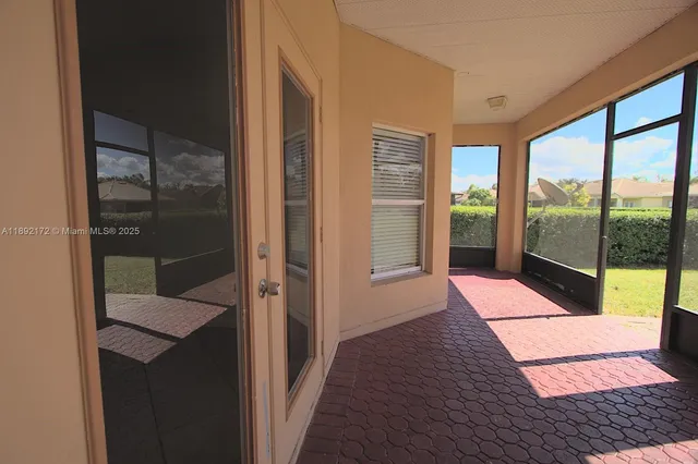 a view of house with yard