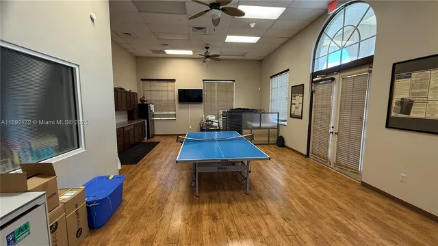 a view of a lake with houses in the back