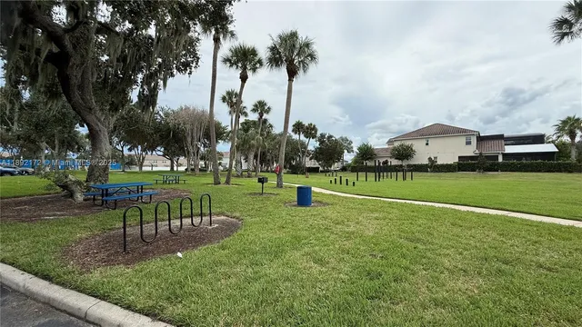 a view of a park with swings