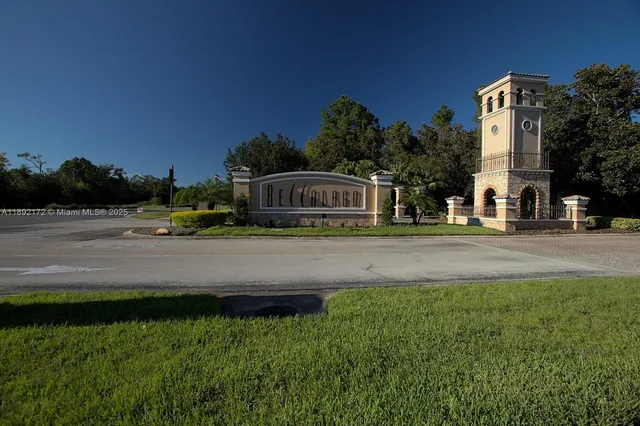 an aerial view of a house with yard swimming pool and outdoor seating