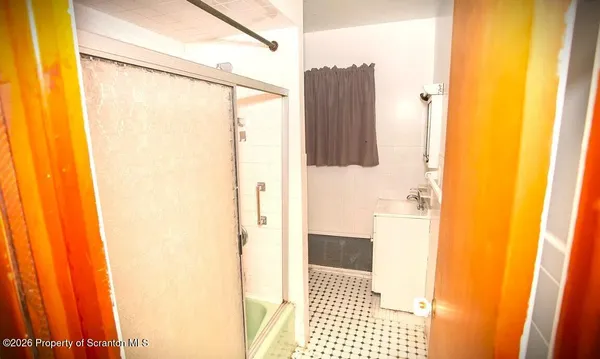 a bathroom with a toilet and a sink