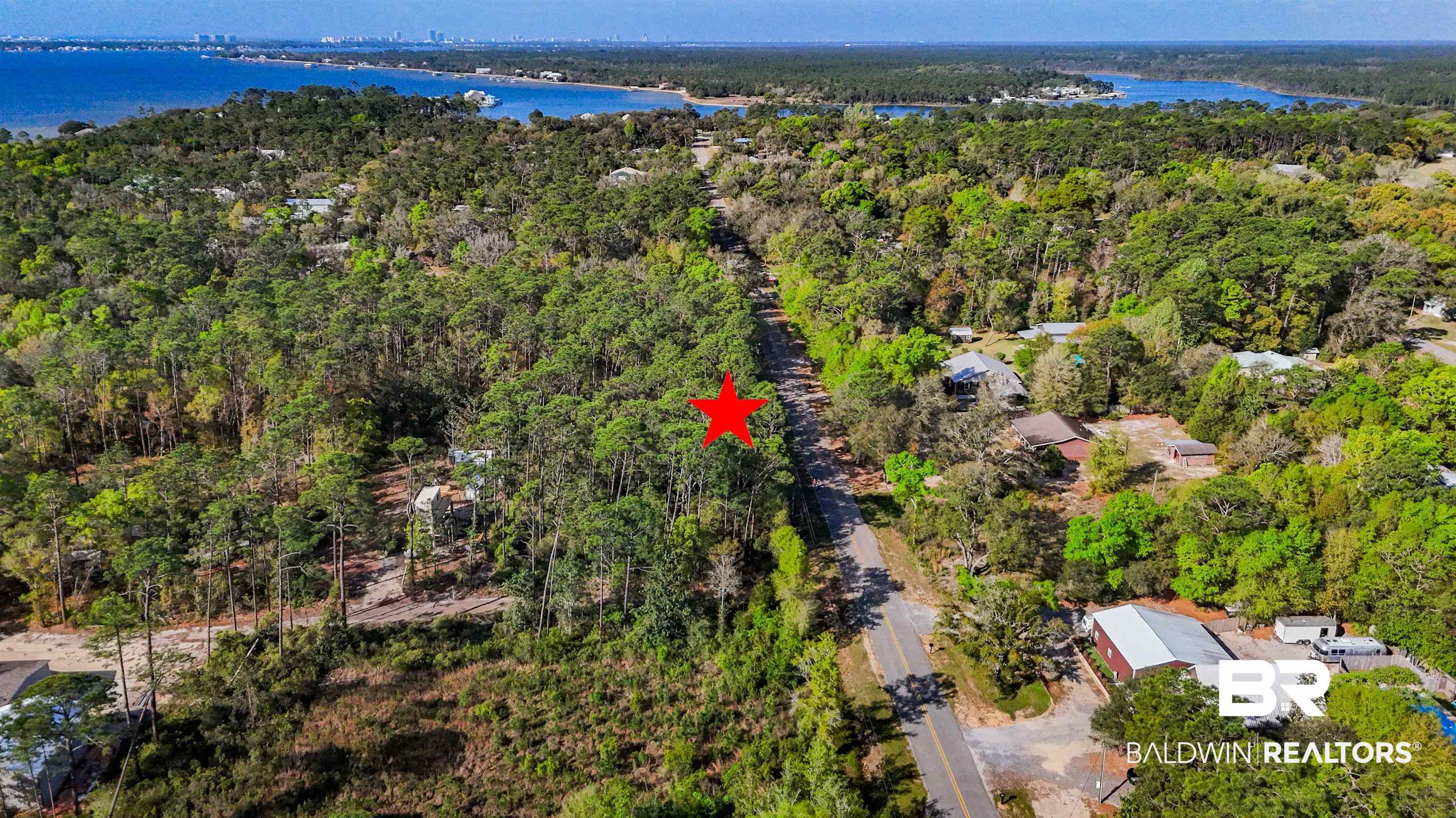 0 Cypress Street Elberta, AL 36530 - Photo 3 of 7 Aerial view of a nearby body of water and a forest