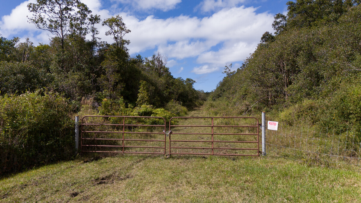 4 North Glenwood Road Mountain View, HI 96771 - Photo 7 of 7 a view of a bench in a yard