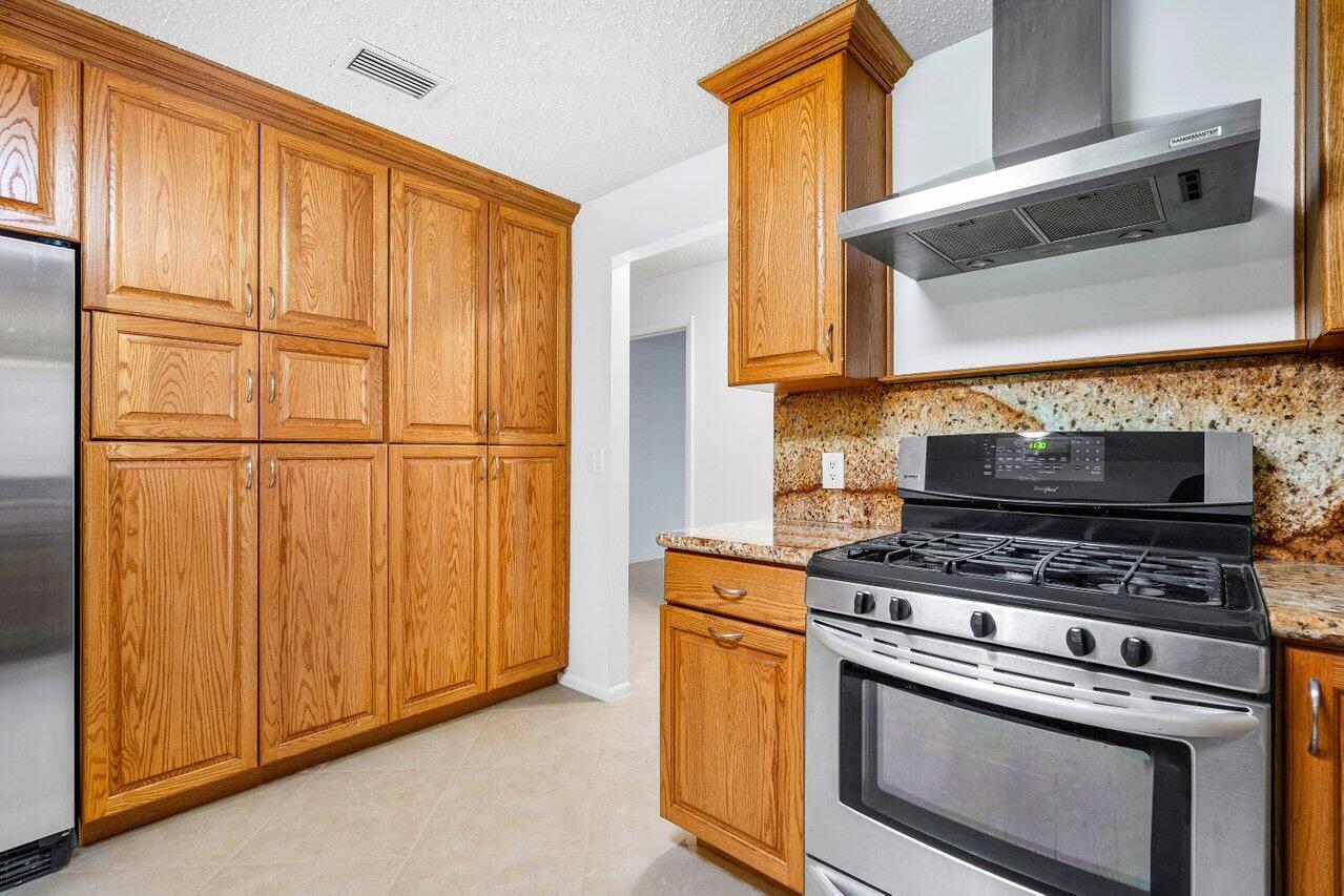 2423 Timbercreek Circle Northwest Boca Raton, FL 33431 - Photo 17 of 50 Kitchen