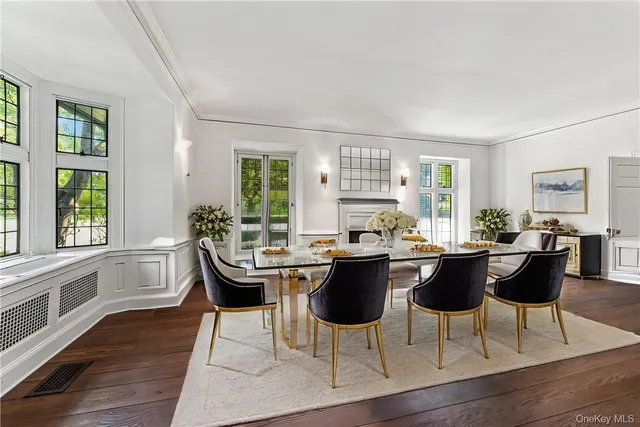 a kitchen with a table and chairs