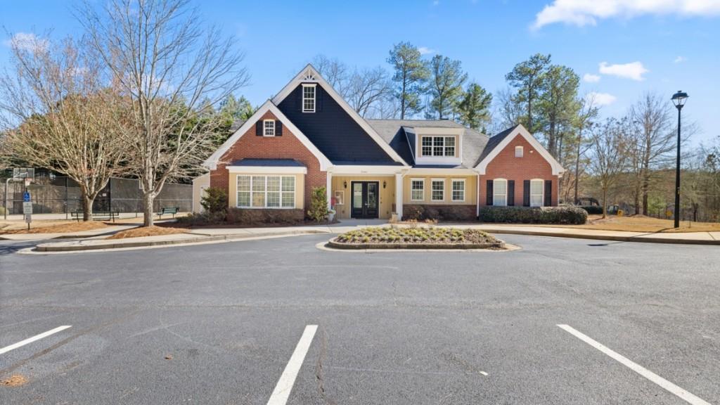 6008 Muirfield Point Union City, GA 30213 - Photo 25 of 29 a front view of a house with a yard and garage