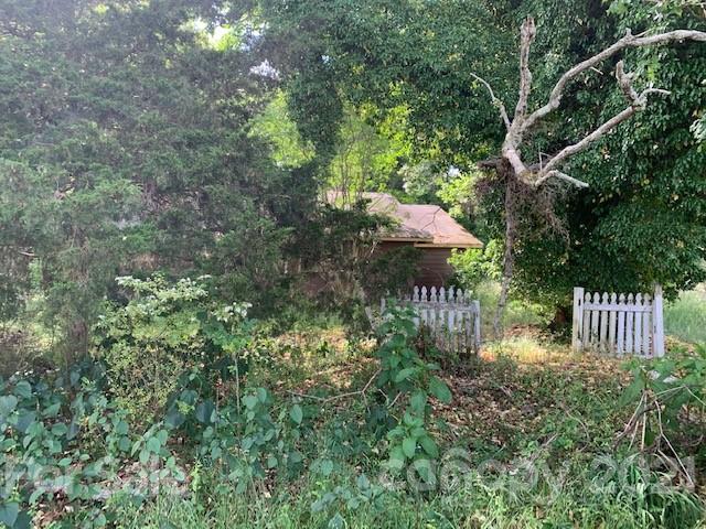 1715 Trinity Church Road Monroe, NC 28112 - Photo 2 of 3 a view of outdoor space and garden