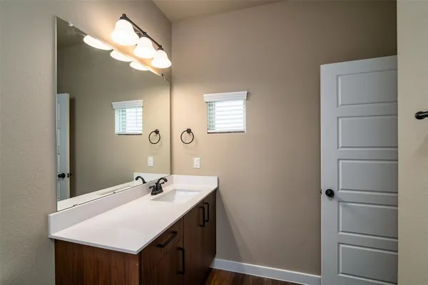 a bathroom with a shower and a toilet