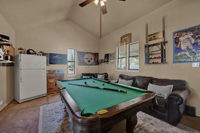a room with furniture and a chandelier
