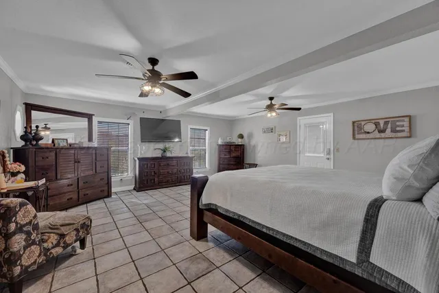 a bed room with a bed and furniture