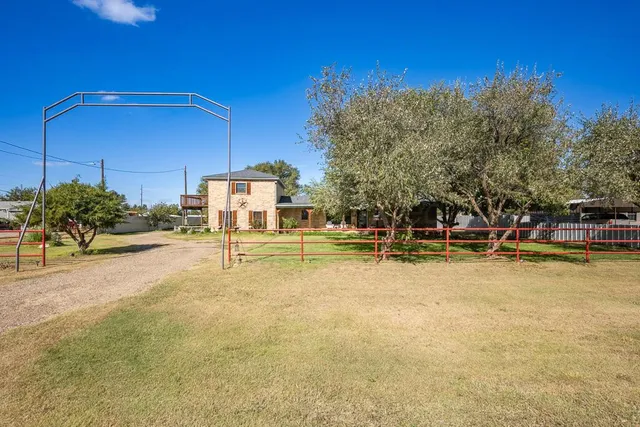 a view of a swimming pool with an outdoor space