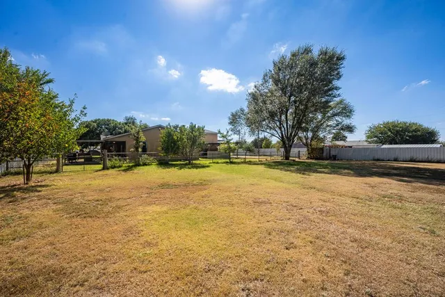 a view of swimming pool with an outdoor space and seating area