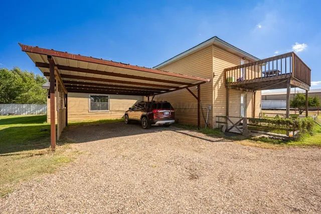a car parked in front of a house