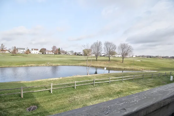 a view of a lake with a big yard