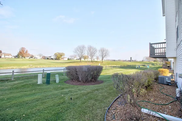 a view of a house with a garage