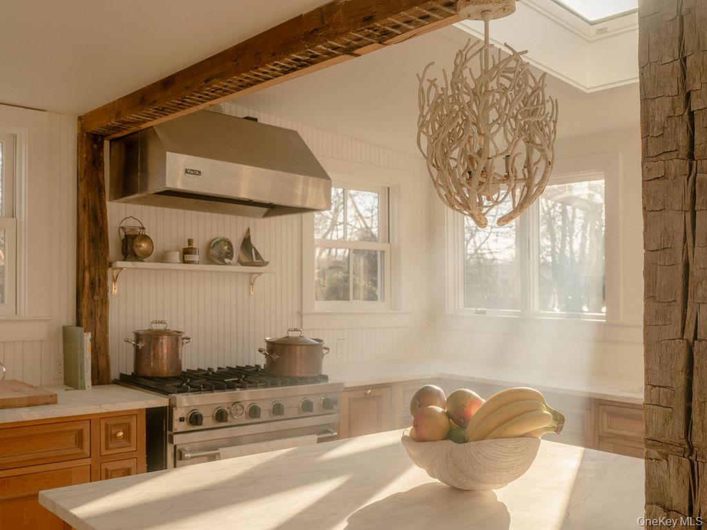 7220 Main Road East Marion, NY 11939 - Photo 13 of 44 a bathroom with a bathtub and shower
