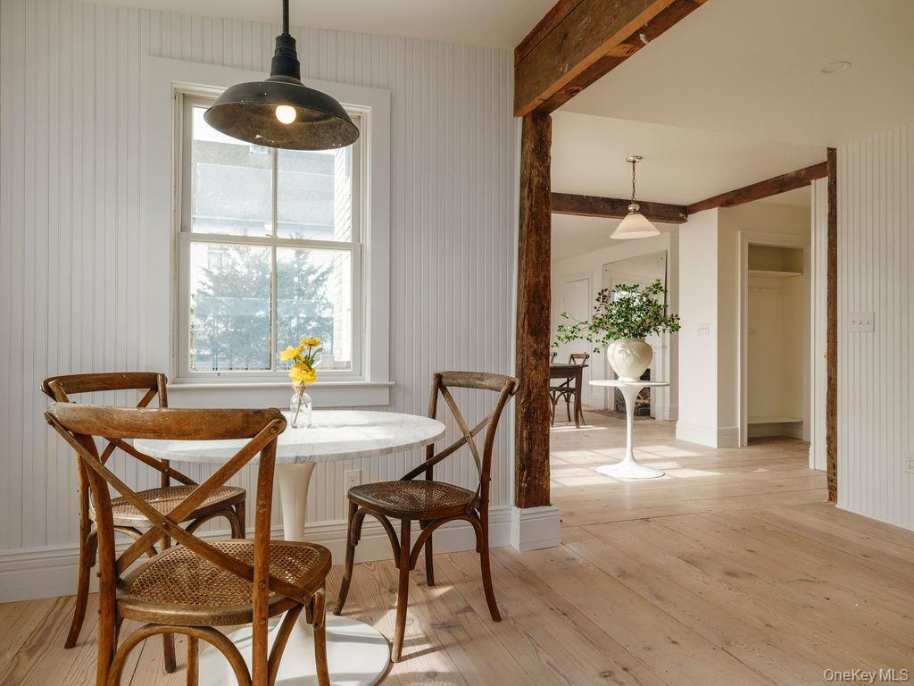 7220 Main Road East Marion, NY 11939 - Photo 15 of 44 a dining room with furniture and window