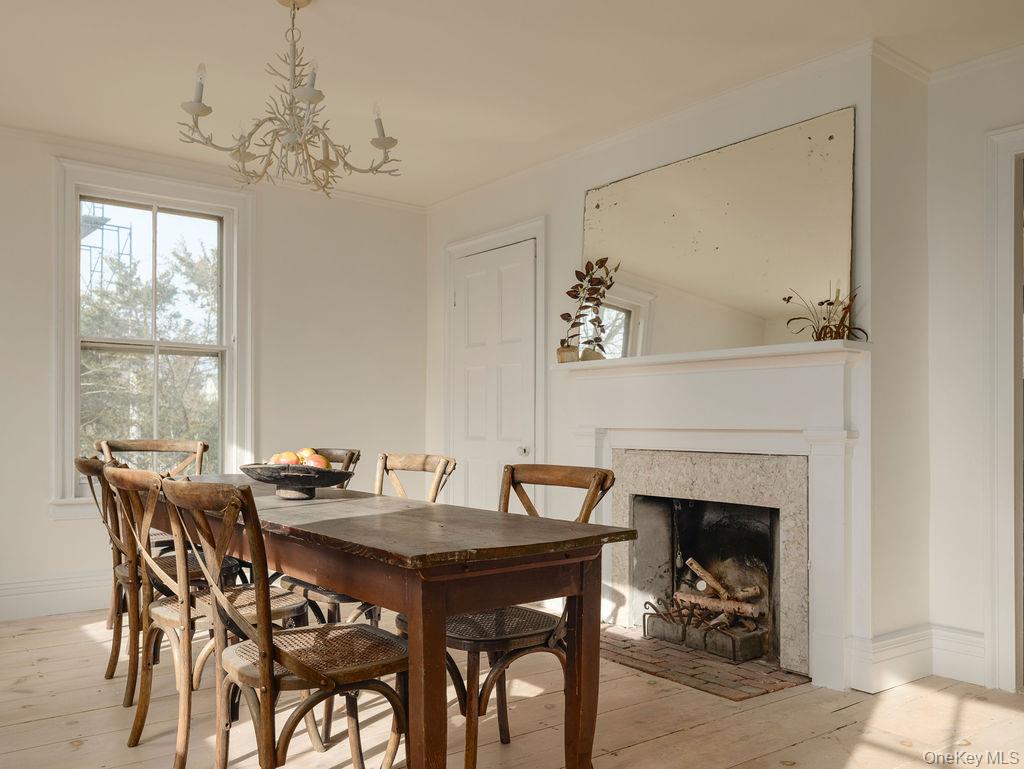7220 Main Road East Marion, NY 11939 - Photo 18 of 44 a view of a dining room with furniture window and outside view