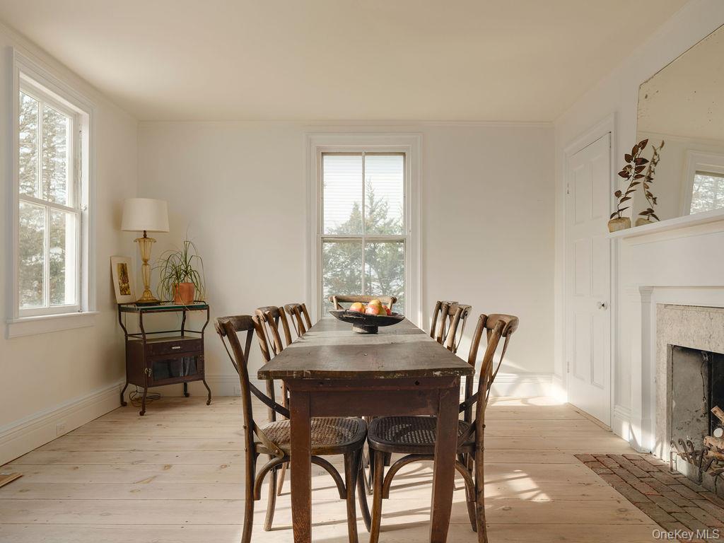 7220 Main Road East Marion, NY 11939 - Photo 19 of 44 a view of a dining room with furniture and window