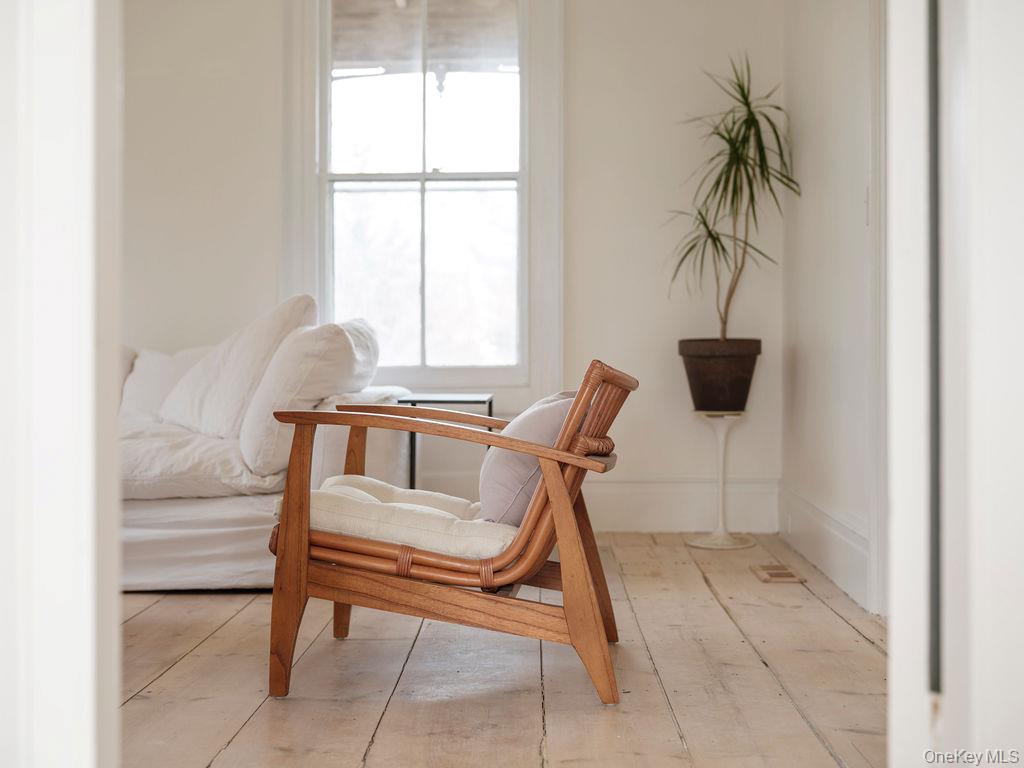 7220 Main Road East Marion, NY 11939 - Photo 20 of 44 a view of hall way with furniture and a window