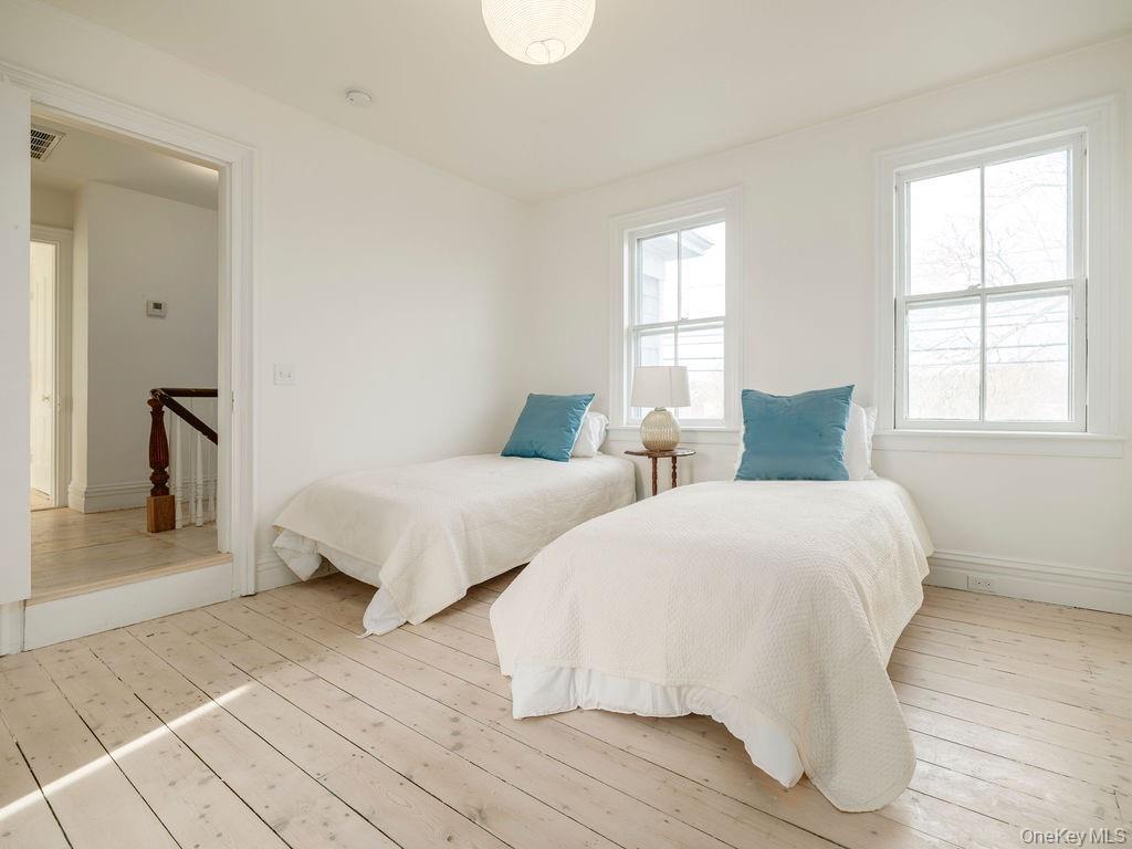 7220 Main Road East Marion, NY 11939 - Photo 35 of 44 a bedroom with two beds and a window