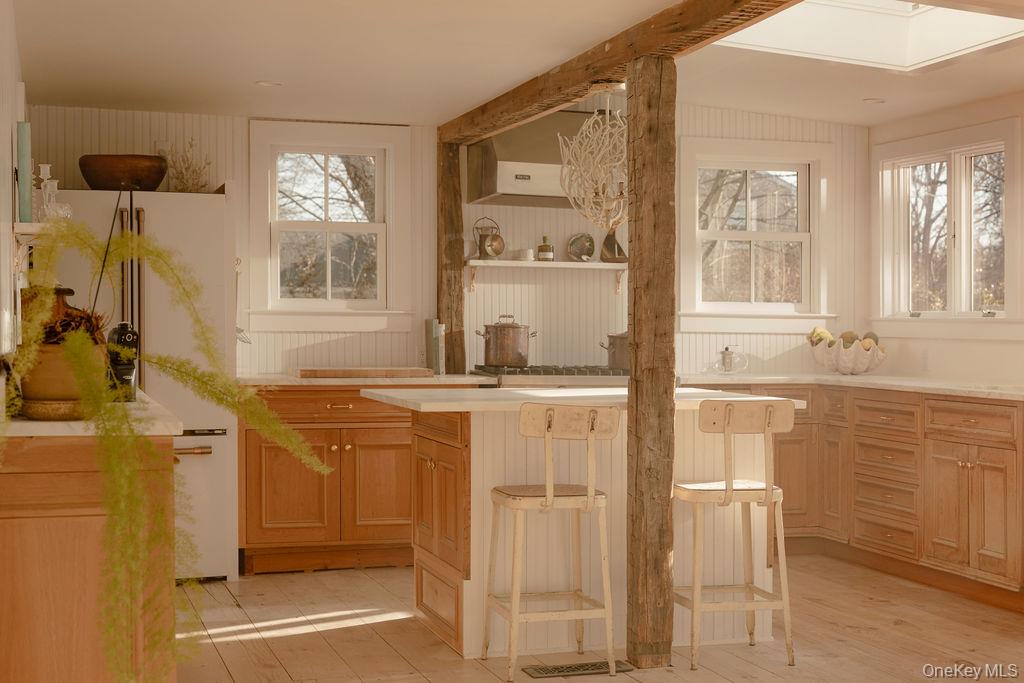 7220 Main Road East Marion, NY 11939 - Photo 8 of 44 a bathroom with a granite countertop sink and a mirror