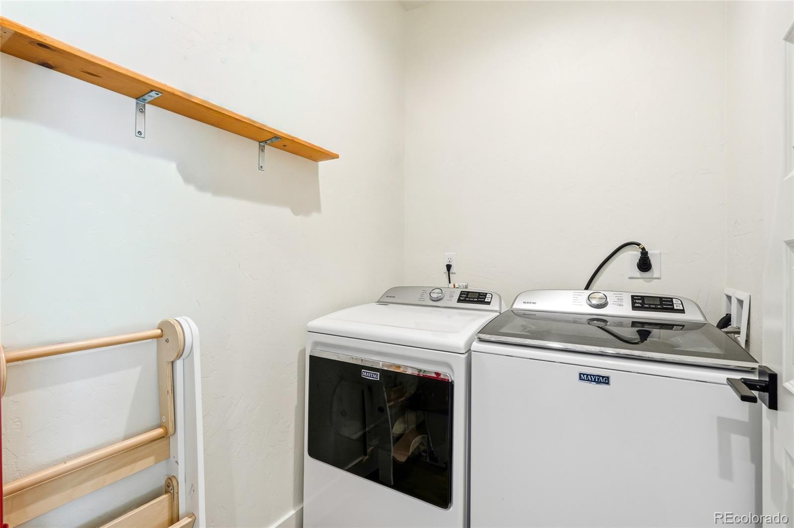 287 Dipper Court Berthoud, CO 80513 - Photo 15 of 29 a utility room with dryer and washer