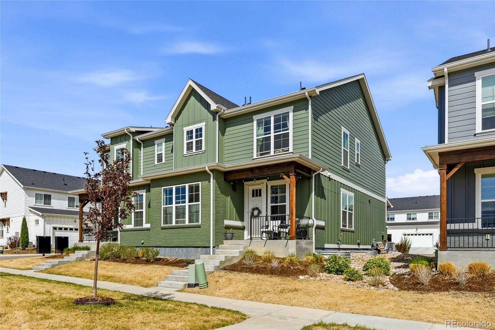 287 Dipper Court Berthoud, CO 80513 - Photo 2 of 29 a front view of a house with a yard