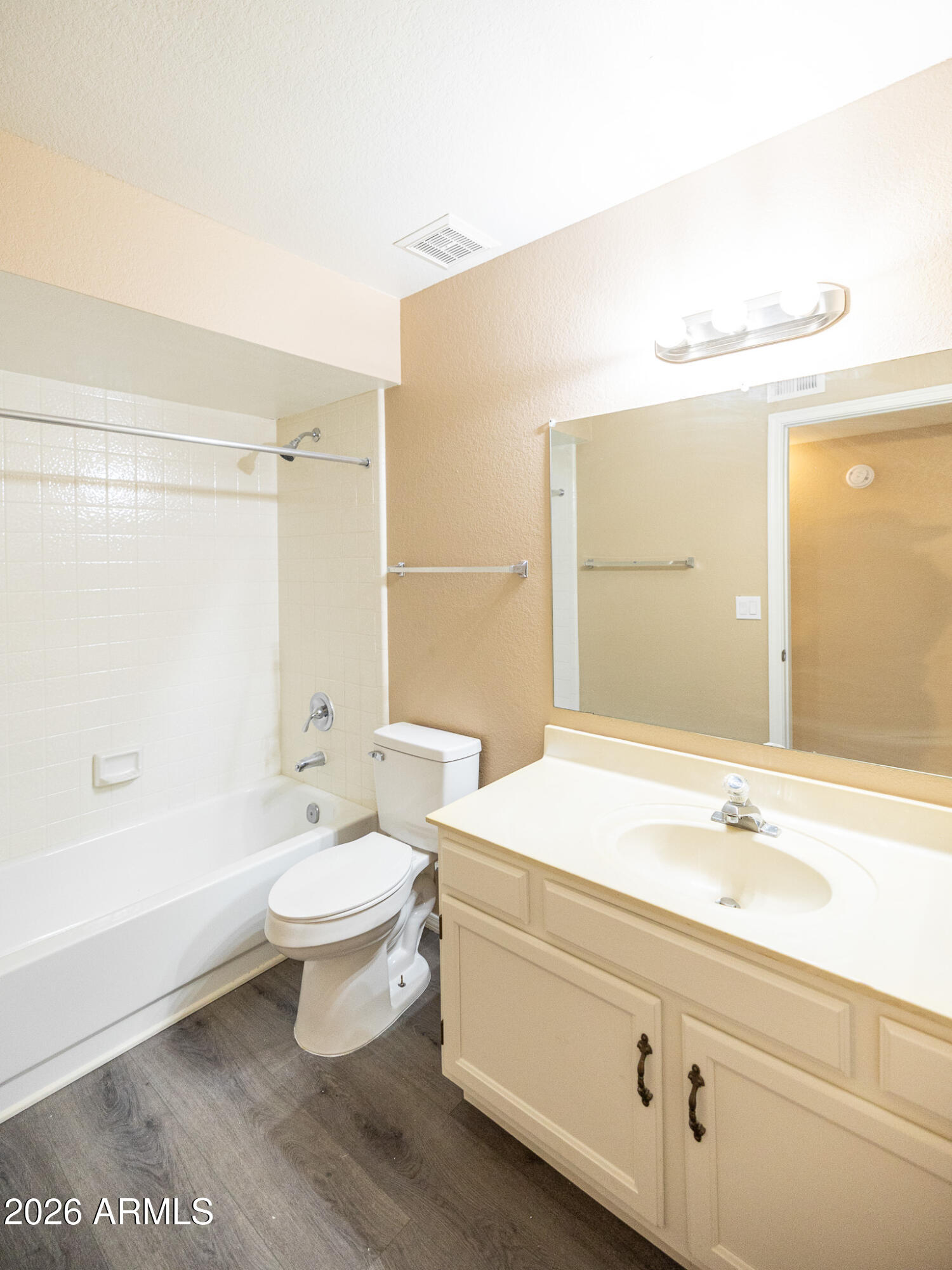 542 South Higley Road, Unit 104 Mesa, AZ 85206 - Photo 15 of 22 a bathroom with a sink a toilet and shower