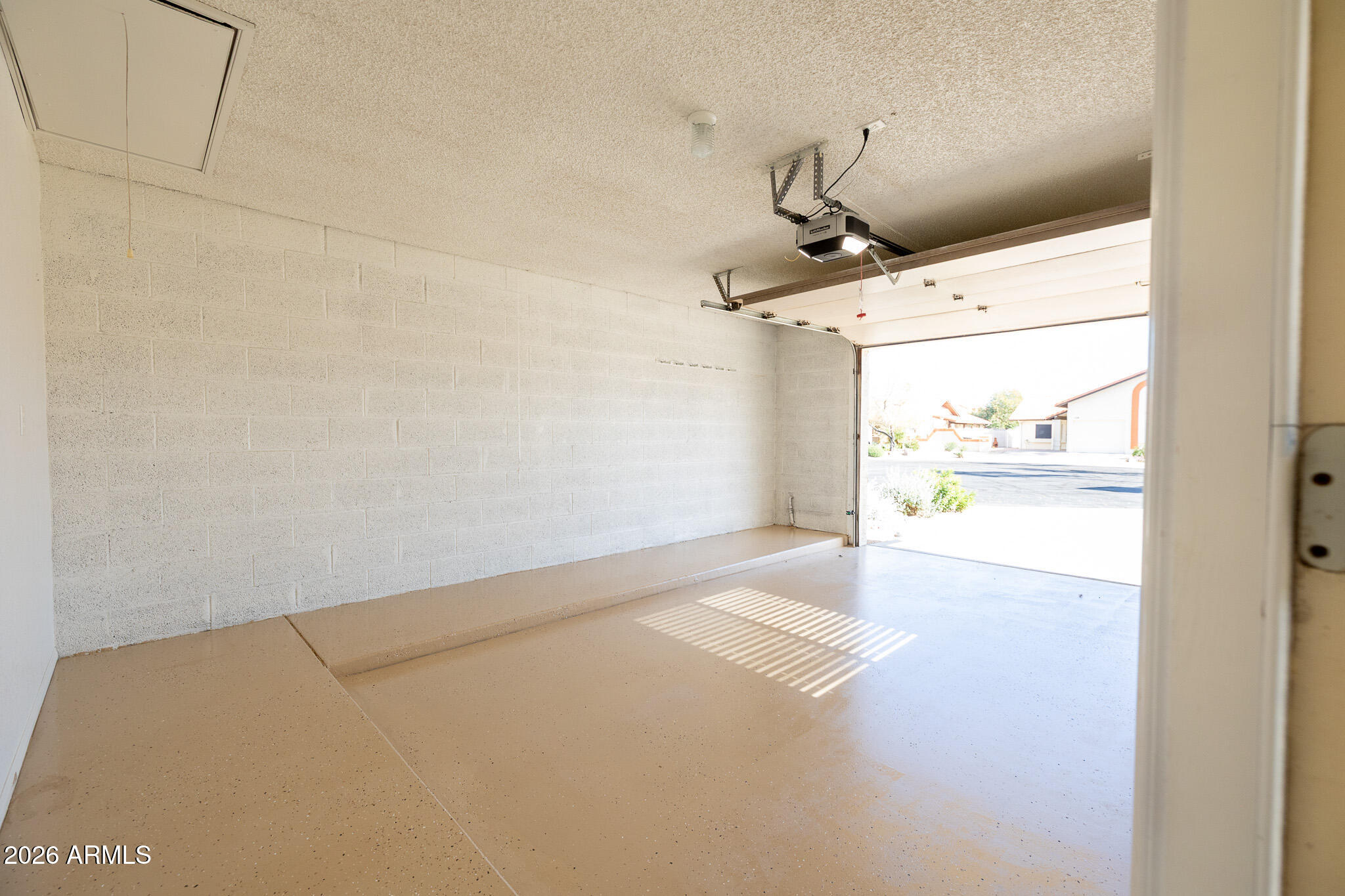 542 South Higley Road, Unit 104 Mesa, AZ 85206 - Photo 4 of 22 a view of room with a hallway
